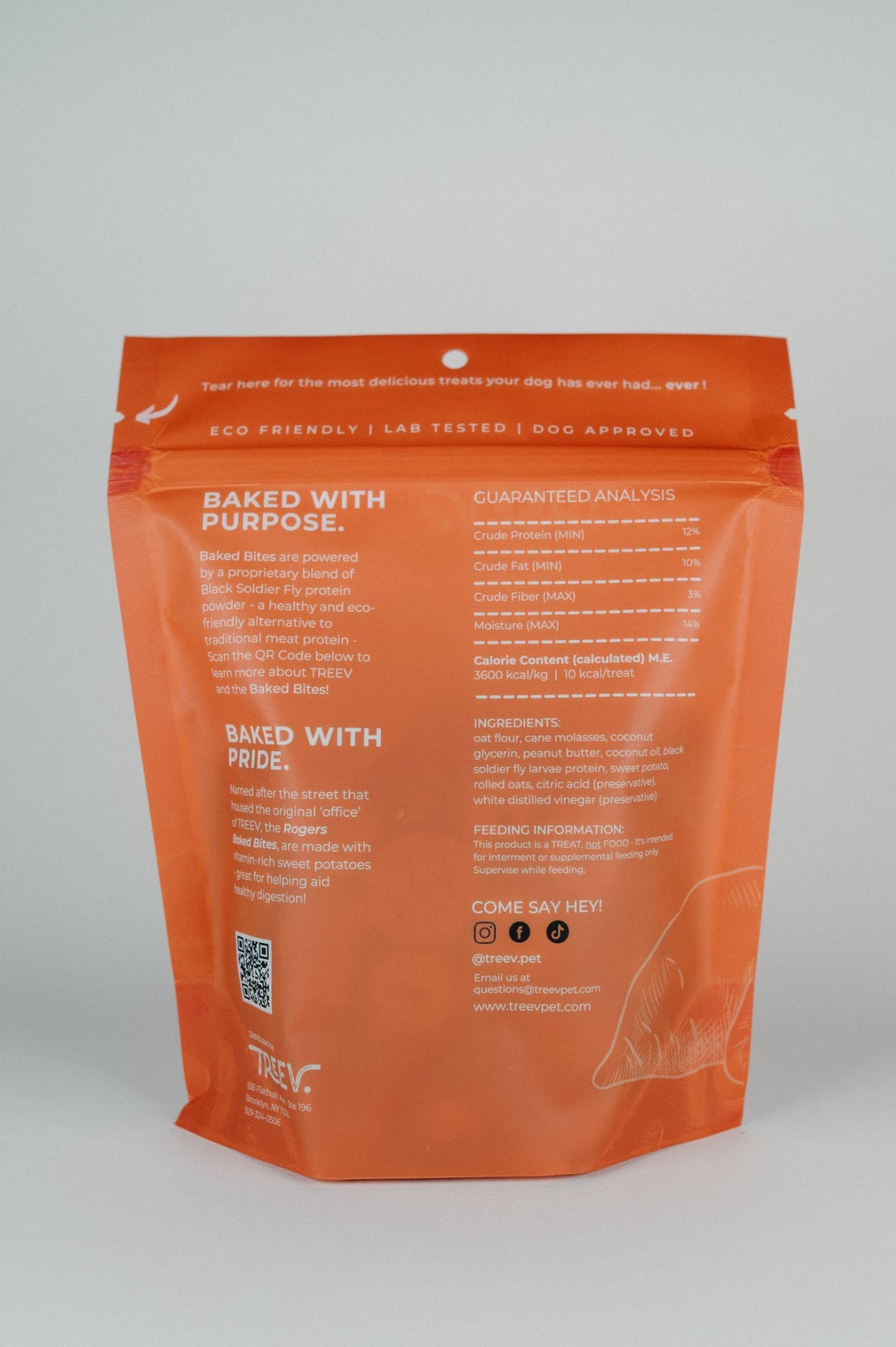 Back of the TREEV Rogers Baked Bites bag showing ingredients, guaranteed analysis and feeding information
